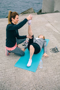 High angle view of woman sitting in water