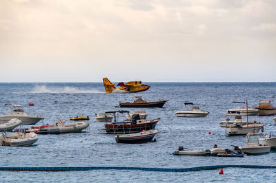 Nautical vessel on sea against sky