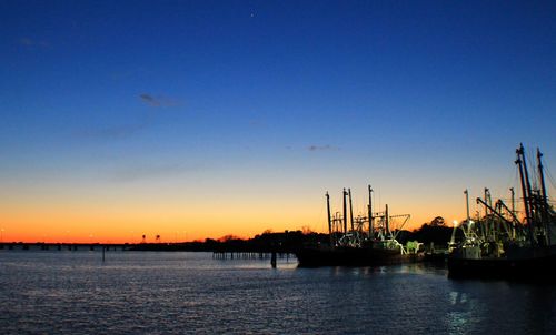 Scenic view of sea against sky at sunset