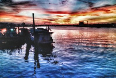 Scenic view of sea against dramatic sky