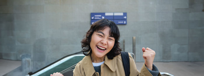 Young woman using mobile phone