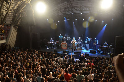 People enjoying music concert