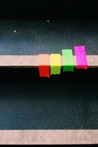 High angle view of colorful adhesive tapes on table