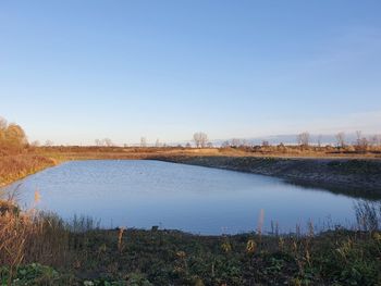 Scenic view of lake against clear sky