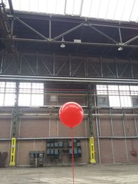 Low angle view of stop sign at railway station