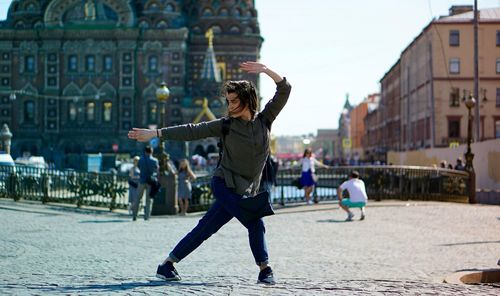 Woman standing in city