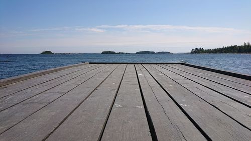 Pier over sea against sky in sweden