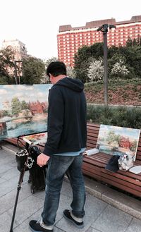 Rear view of man looking at city