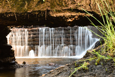 View of waterfall in forest