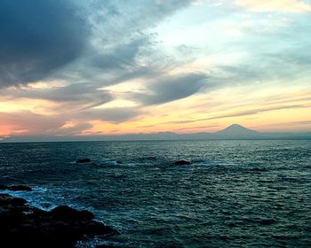 Scenic view of sea at sunset