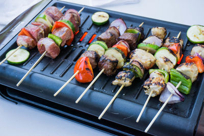 High angle view of vegetables on barbecue grill