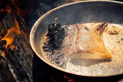 High angle view of food on barbecue grill