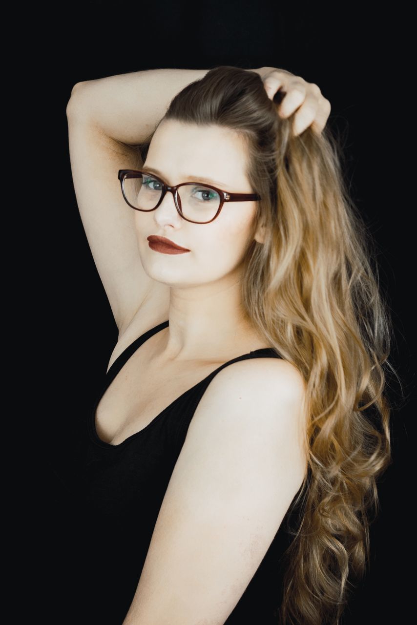 young adult, studio shot, black background, portrait, one person, hair, young women, indoors, beautiful woman, women, eyeglasses, looking at camera, beauty, glasses, blond hair, adult, hairstyle, lifestyles, headshot, fashion
