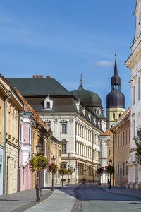 Street with historical houses in trnava downtown, slovakia