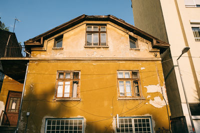 Low angle view of residential building against sky