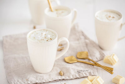 Close-up of coffee cup on table