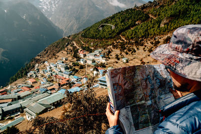 High angle view of people walking on mountain