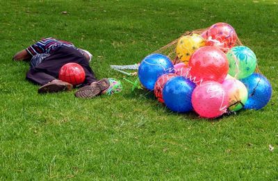 High angle view of multi colored umbrellas on field