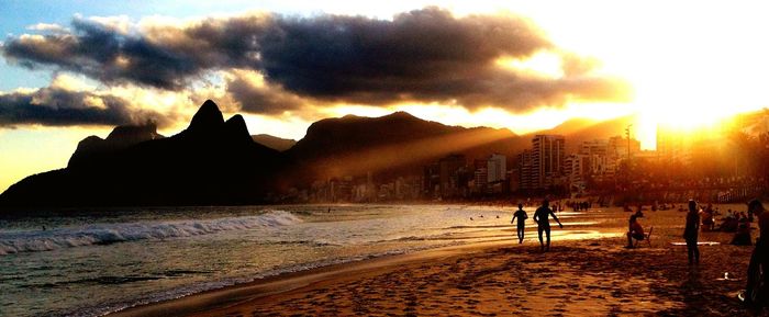 Silhouette of people at beach