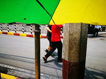 Full length of man on road