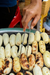 Close-up of man hand for sale in market