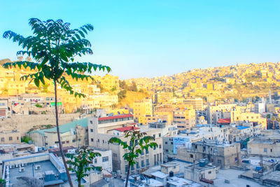 View of cityscape against clear sky