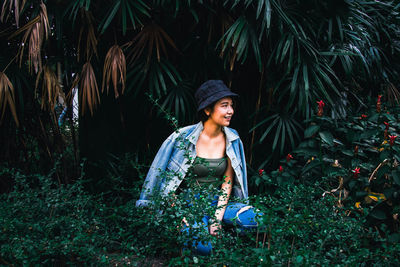 Portrait of young woman looking away