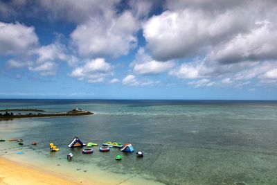 Scenic view of sea against cloudy sky