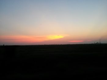 Scenic view of silhouette landscape against sky during sunset