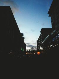 Buildings in city at night