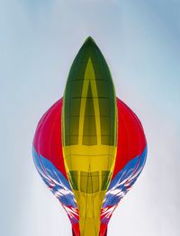 Low angle view of hot air balloons against sky