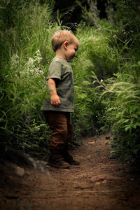 Full length of boy standing on land