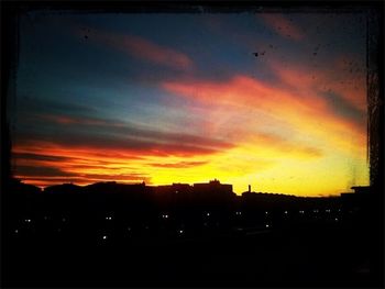 Scenic view of dramatic sky during sunset