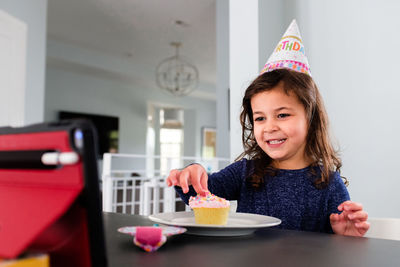 Portrait of a smiling girl in plate