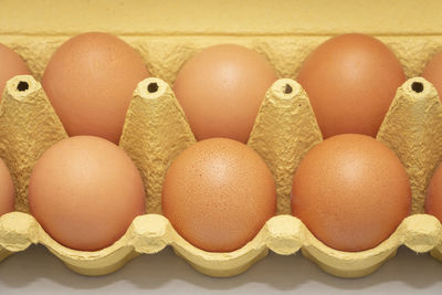 Close-up of eggs in crate