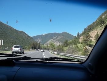 Road seen through car windshield