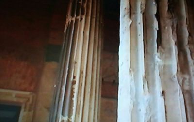 Low angle view of icicles hanging from window