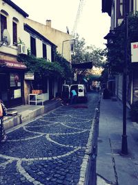 Street amidst buildings in city