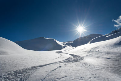 Snow covered mountain against sky