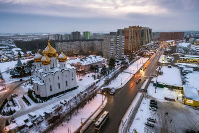 High angle view of street amidst buildings in city