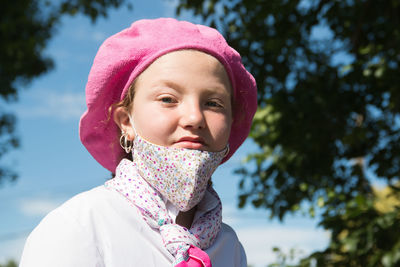 Beautiful girl wearing protective face mask