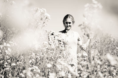 Woman on flowery field