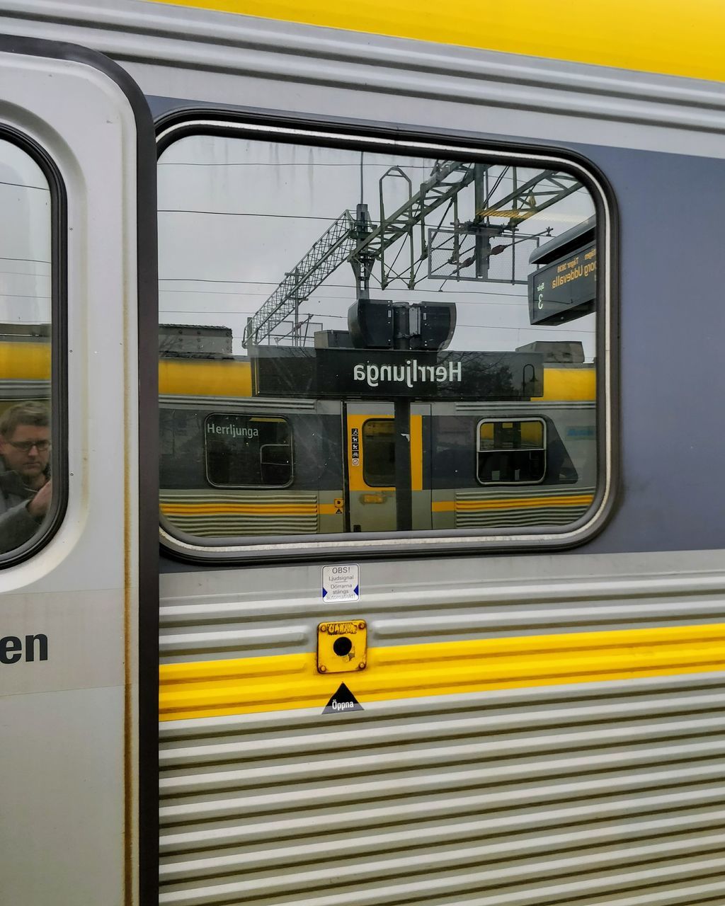 yellow, public transportation, transportation, text, mode of transport, train - vehicle, window, communication, rail transportation, land vehicle, day, no people, indoors