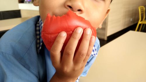 Close-up of woman holding hands