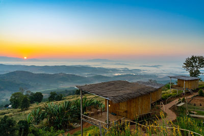 Scenic view of landscape against sky during sunset