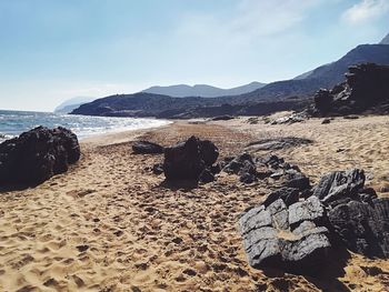 Scenic view of beach against sky