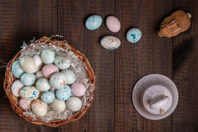 High angle view of eggs in basket on table