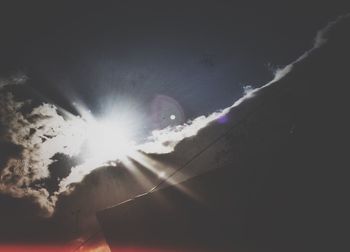 Sun shining through clouds