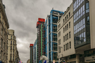 Low angle view of skyscrapers against sky