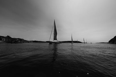 Boats sailing in sea